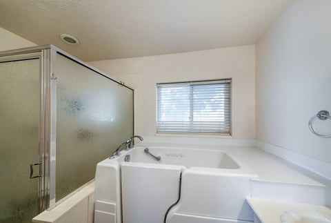 Bariatric walk-in tub